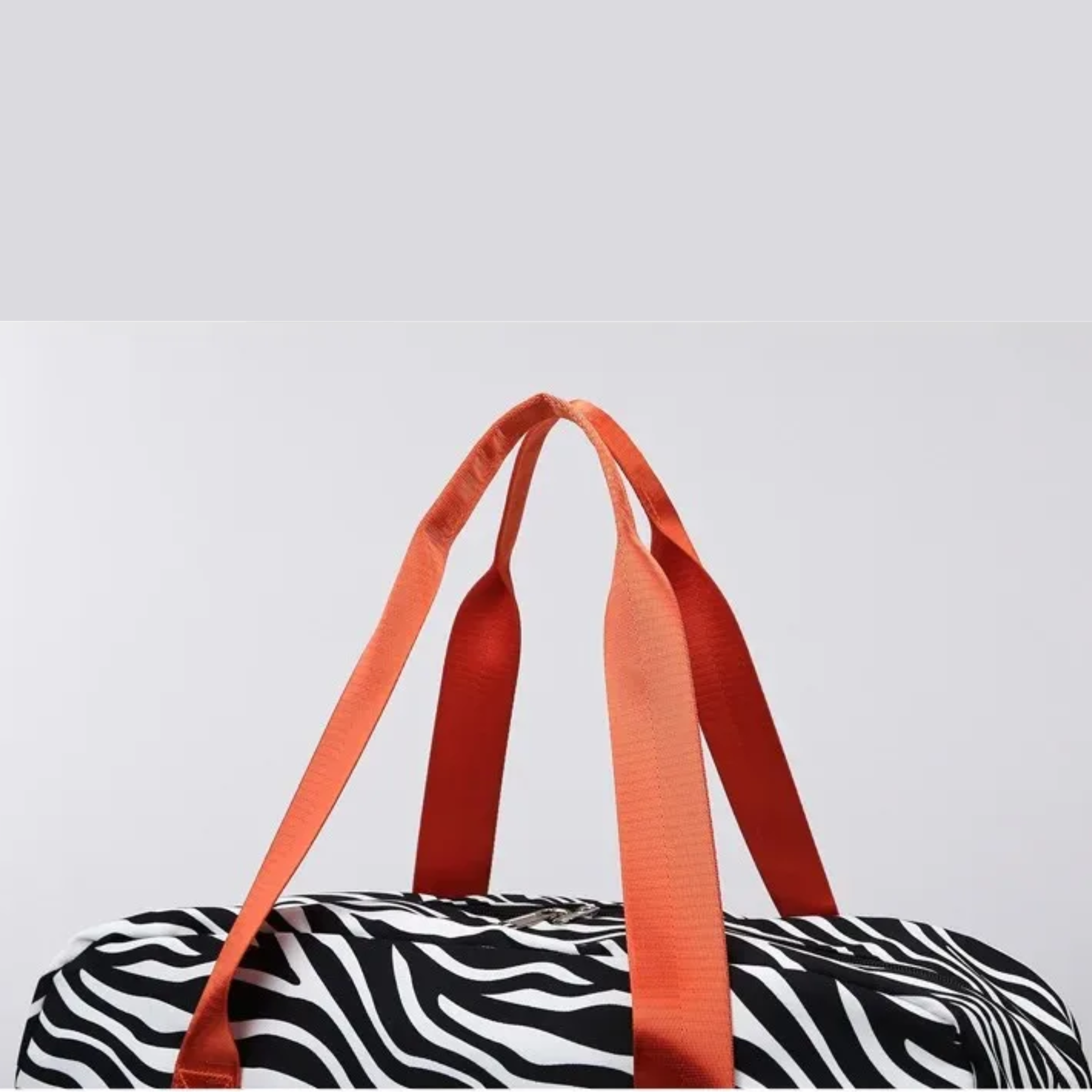 Bolsa feminina mala de bordo estampa zebra, compatível com medidas de companhias aéreas.