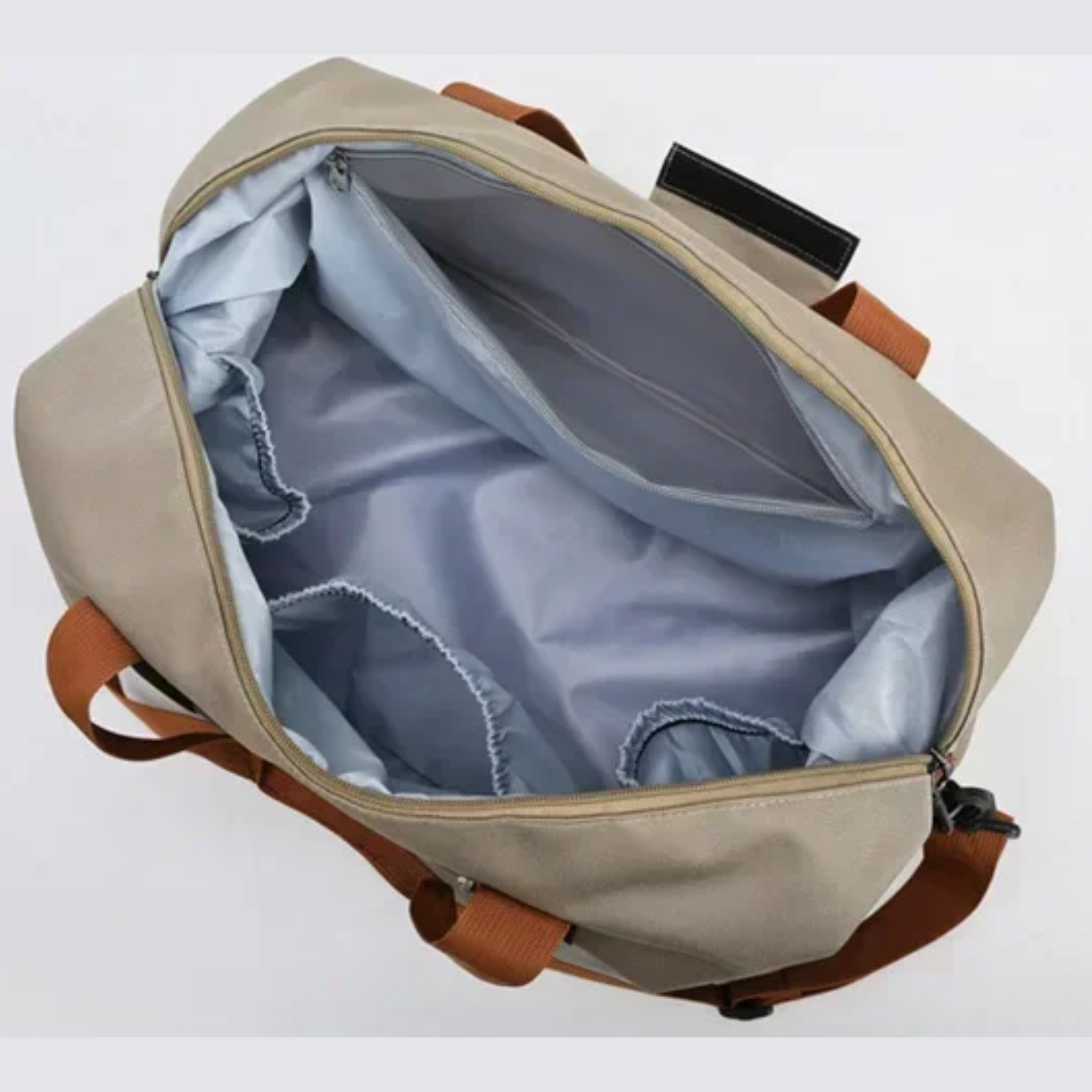 Detalhe da alça de mão reforçada da bolsa feminina UltraPack bege